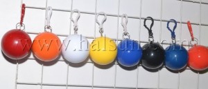 Compressed Raincoats in colored balls with keyrings